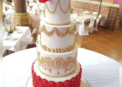 Wedding Cake with 4 tiers - red rose crushed border with large red rose head