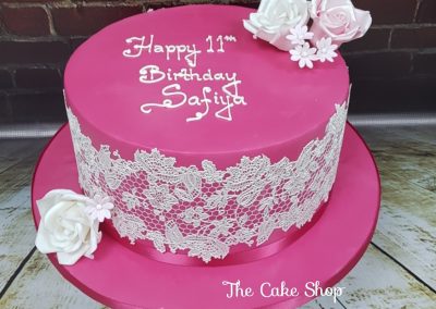 Birthday Cake - Pink cake with white lace and flowers