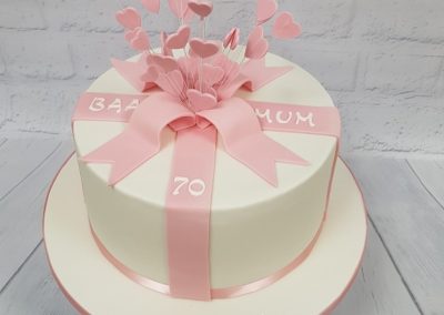 Happy Birthday Mum 70th cake - pink ribbons with hearts