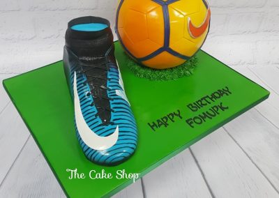 Birthday Cake - Football boot with orange football on green board